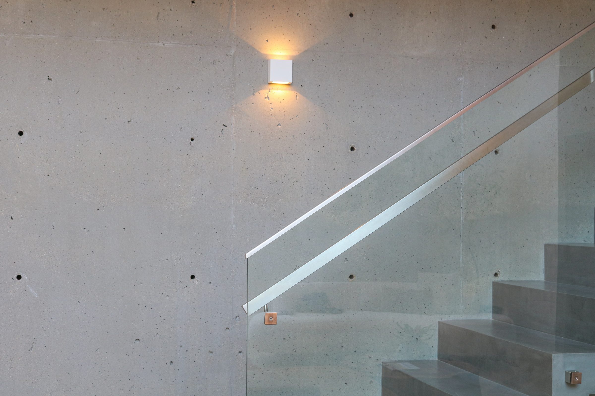 Casa Praia Mole, stair detail with wall sconce
